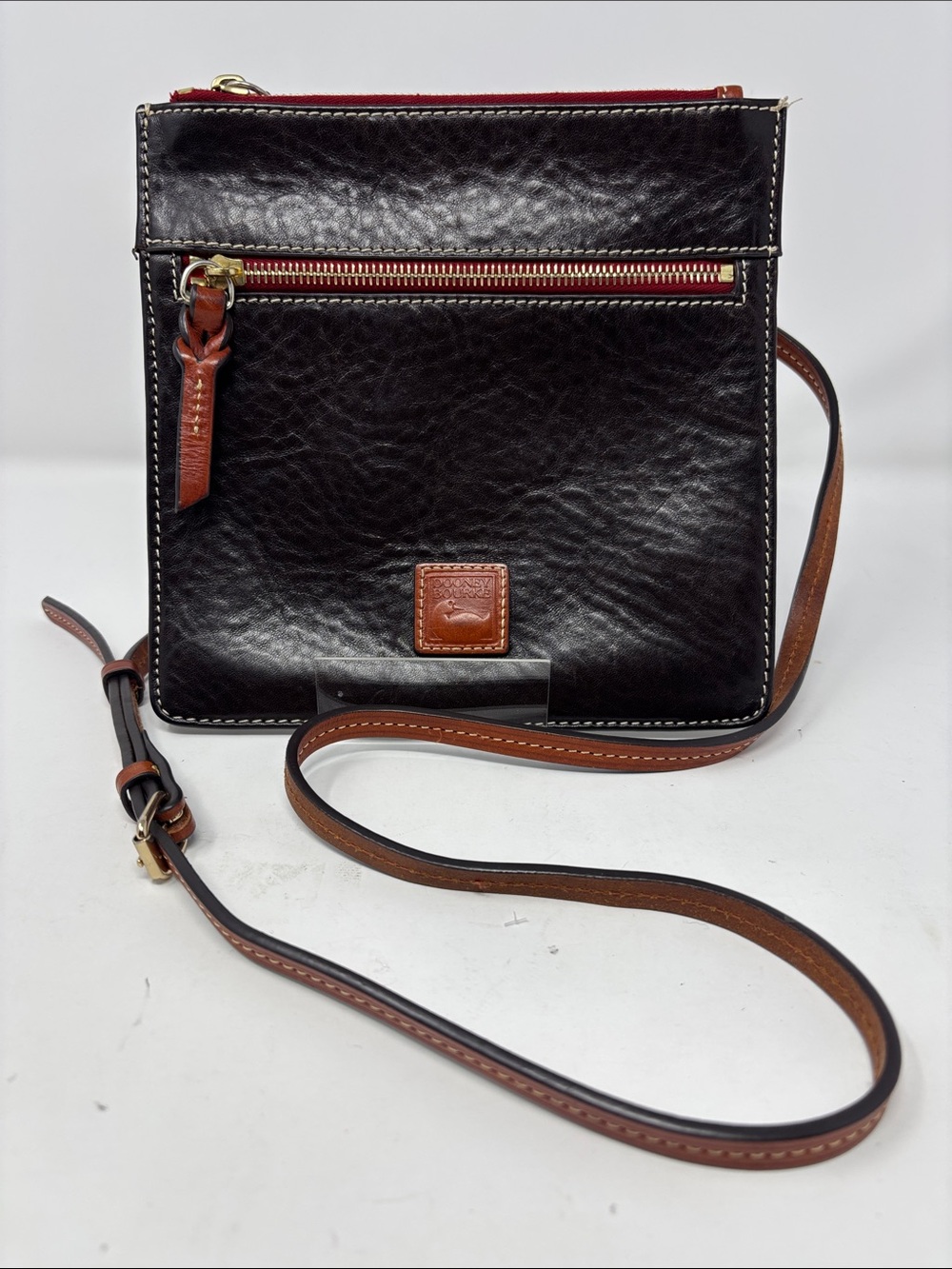 Dooney & Bourke Leather Messenger with Brown Trim